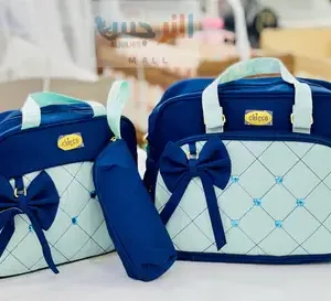 Two stylish blue and mint bags