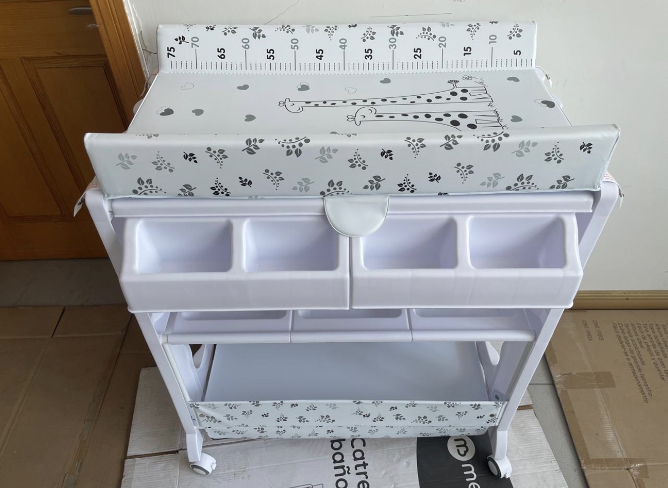 Baby Bath and Changing Station With storage compartment and wheels Baby Bath and Changing Station With storage compartment and wheels