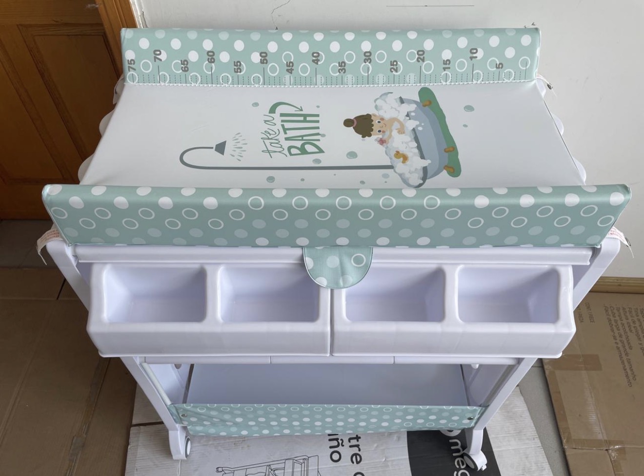 Baby Bath and Changing Station With storage compartment and wheels Baby Bath and Changing Station With storage compartment and wheels