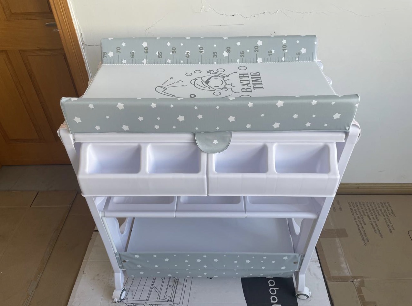 Baby Bath and Changing Station With storage compartment and wheels Baby Bath and Changing Station With storage compartment and wheels