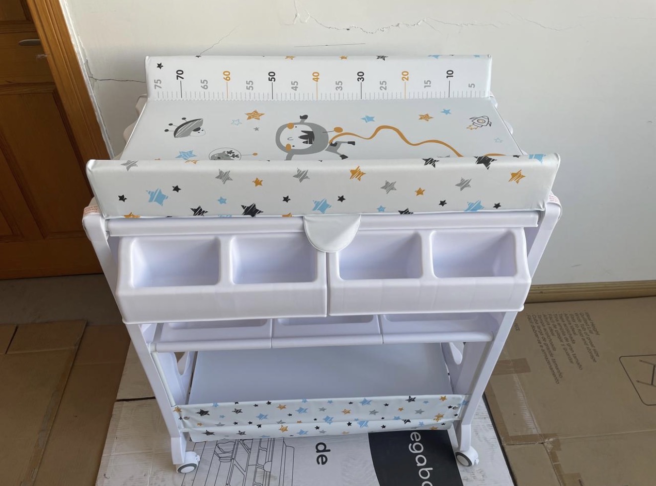Baby Bath and Changing Station With storage compartment and wheels Baby Bath and Changing Station With storage compartment and wheels