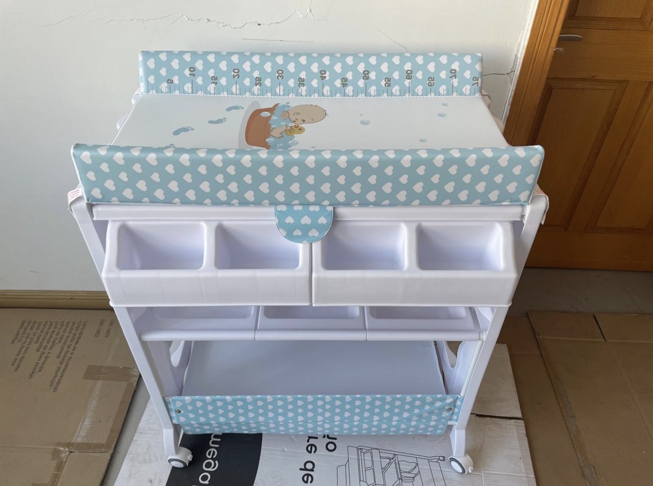 Baby Bath and Changing Station With storage compartment and wheels Baby Bath and Changing Station With storage compartment and wheels
