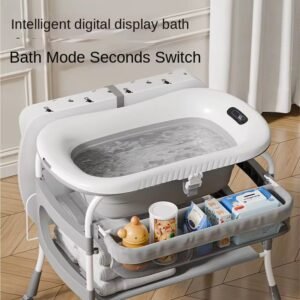 Baby bath and changing station with foldable basin , height adjustable with temperature sensor