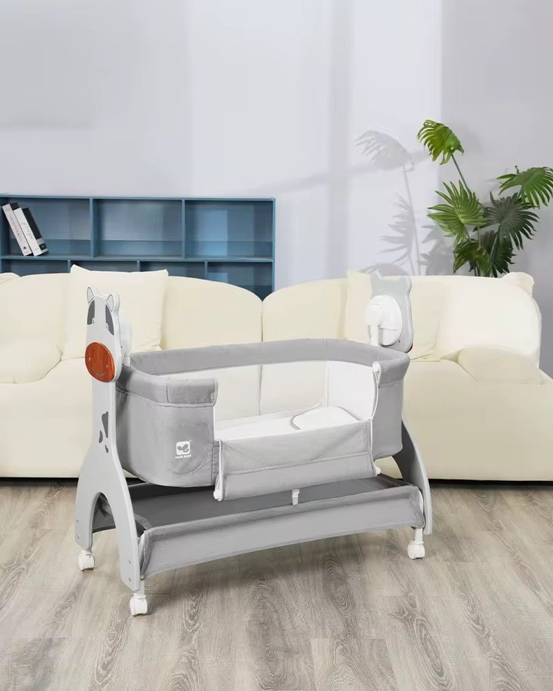 Baby Electric bed Co-Sleeper/bassinet with wheels and overhead toys Baby Electric bed Co-Sleeper/bassinet with wheels and overhead toys
